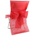 Housse de chaise avec noeud rouge